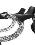 Supacaz Super Sticky Kush Splat Bar Tape With Black Star Plugz - White