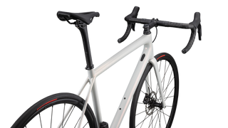 Specialized Aethos Comp - Shimano 105 Di2 - Gloss 100% Red Ghost Pearl Over Dune White/Dune White