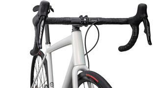 Specialized Aethos Comp - Shimano 105 Di2 - Gloss 100% Red Ghost Pearl Over Dune White/Dune White