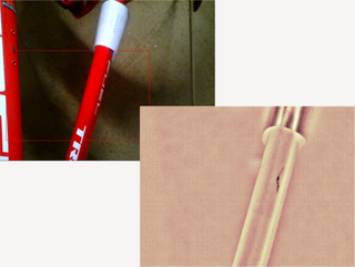 a setup and thermographic photo showing a crack of a trek carbon bike frame