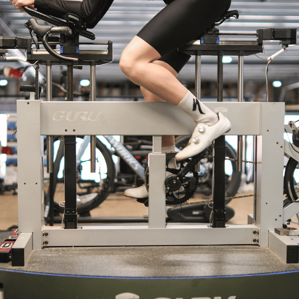 Person using Guru bike fitting machine