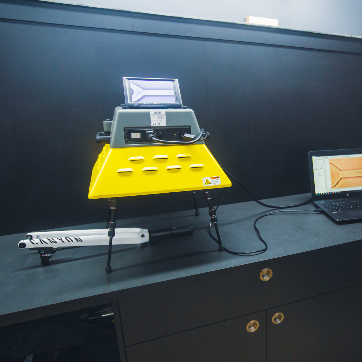 Thermal imaging carbon fibre testing machine scanning a carbon bike frame
